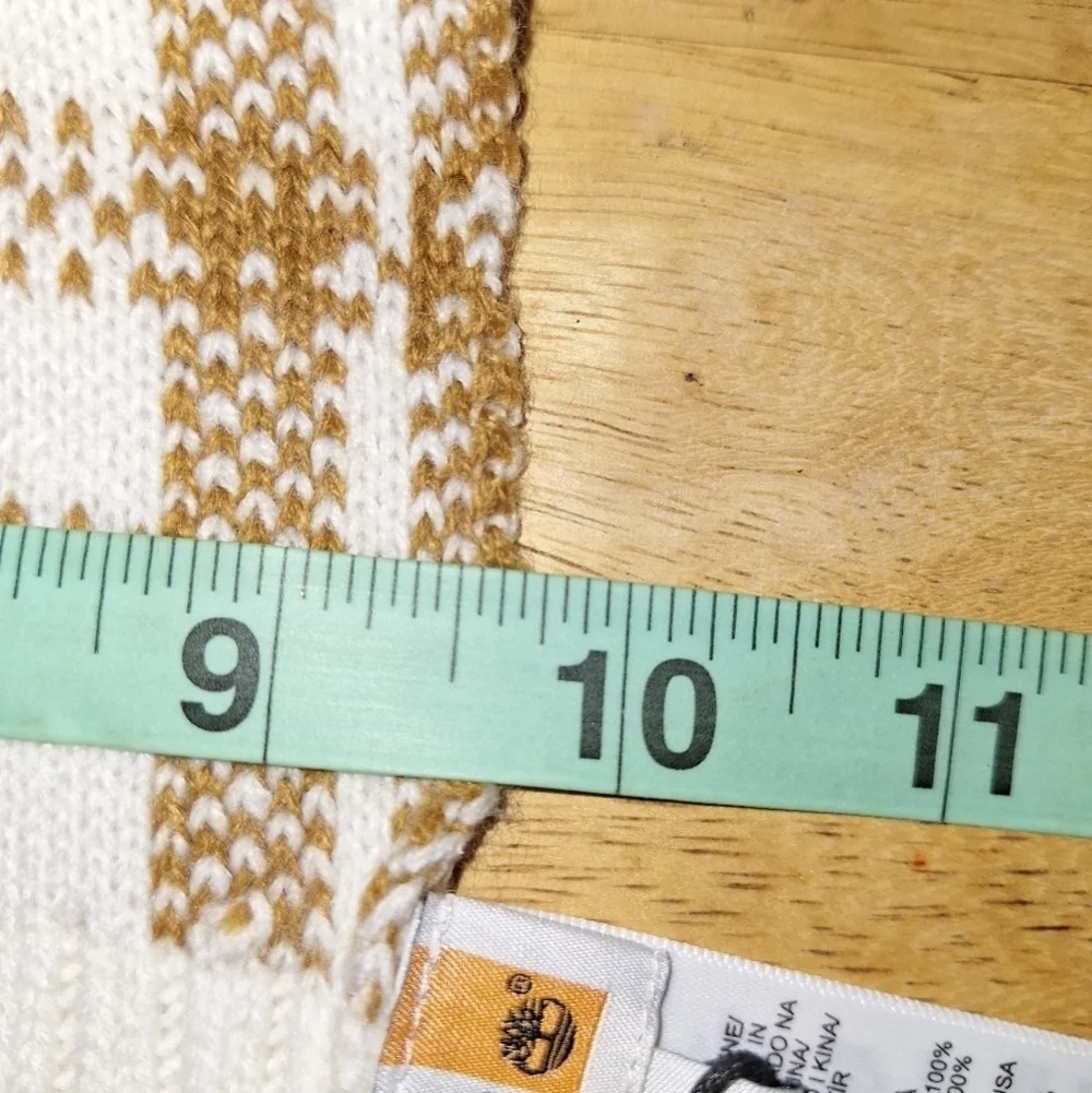 A Timberland white/ lt. brown plaid scarf that's 67